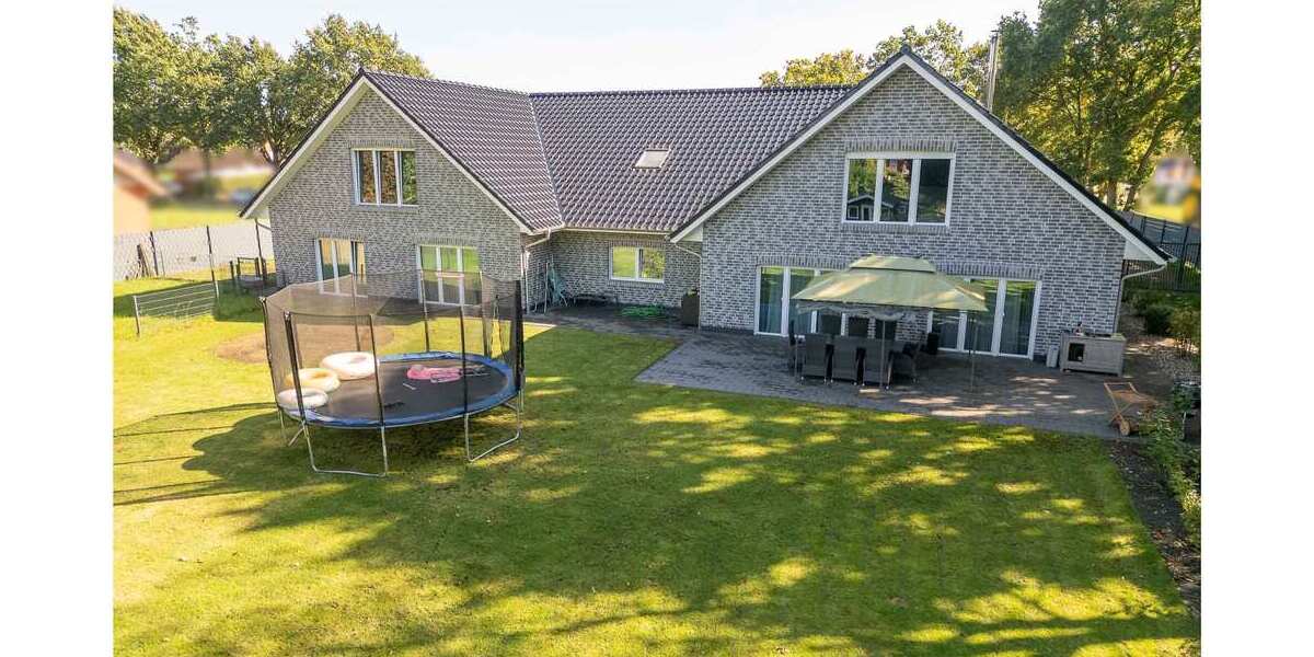 ***Modernes Anwesen - Haus mit Einliegerwohnung auf ca. 4.900 m² Grundstück mit Teich in Flachsmeer*** - Einfamilienhaus Westoverledingen | Angebot:23273632