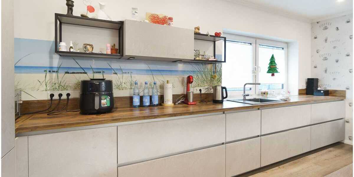 ***Modernes Anwesen - Haus mit Einliegerwohnung auf ca. 4.900 m² Grundstück mit Teich in Flachsmeer*** - Einfamilienhaus Westoverledingen | Angebot:23273632